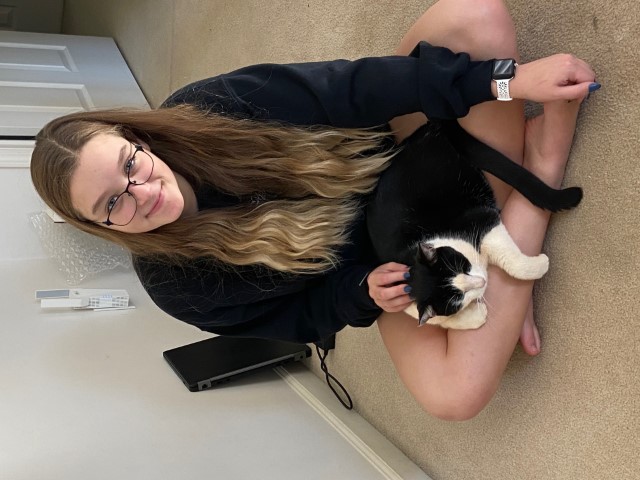 Paige with our cat Hammy